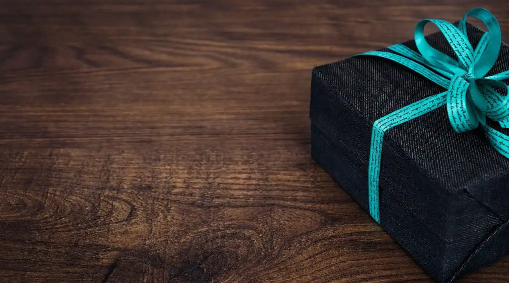 wrapped box sitting on a table to represent subscription box affiliate programs