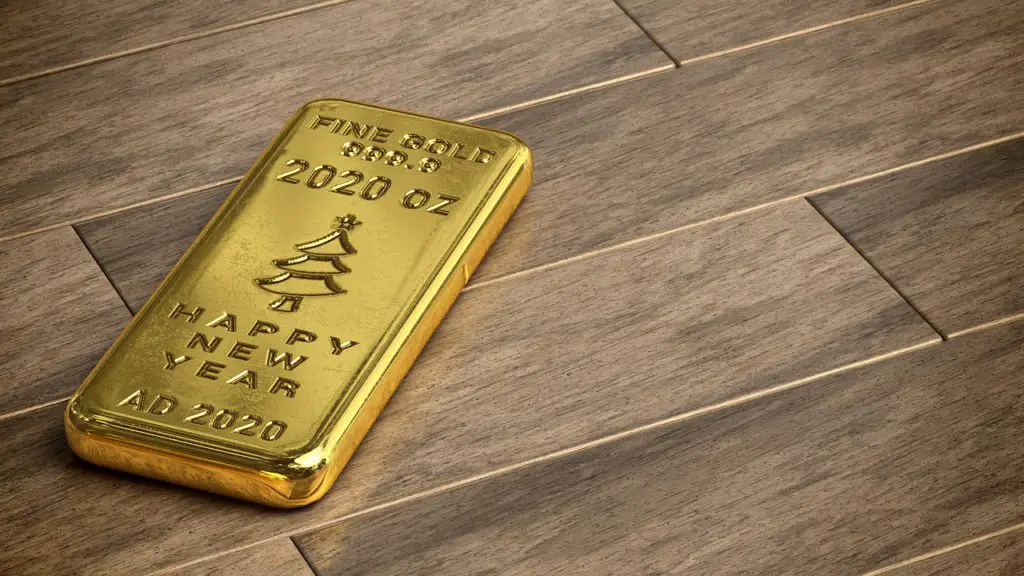 a gold bar on a wooden floor to represent precious metals affiliate programs